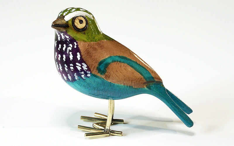Houten vogel miniatuur vorkstaartscharrelaar